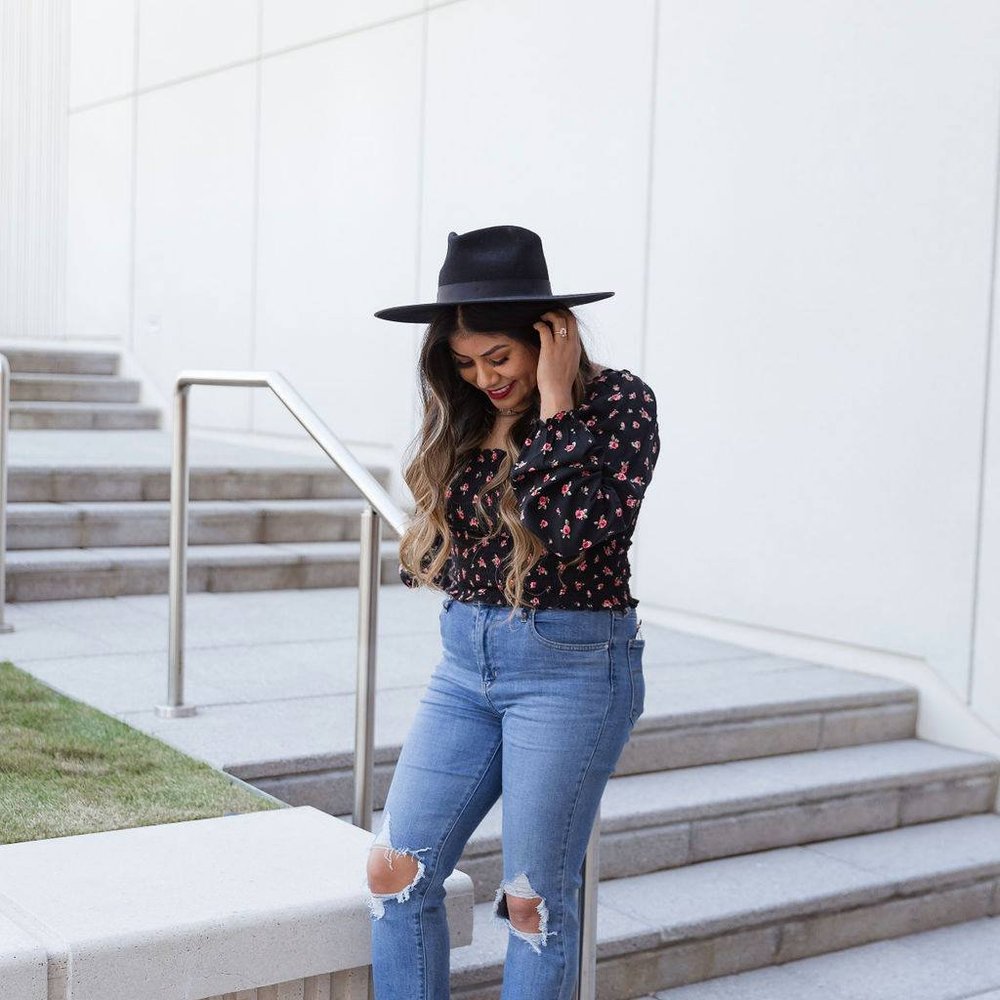 black floral smocked long sleeve top
